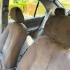 Interior trasero Hyundai Accent gasolina LC 1.3 con asientos tapizados en buen estado