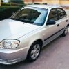 Hyundai Accent LC 1.3 gasolina color plata, berlina compacta en perfecto estado exterior
